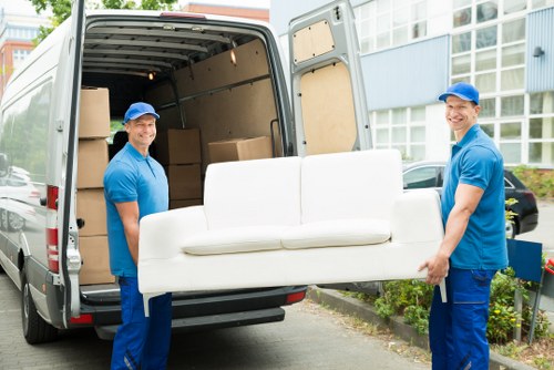 Furniture pick-up service arriving in a Charingcross street