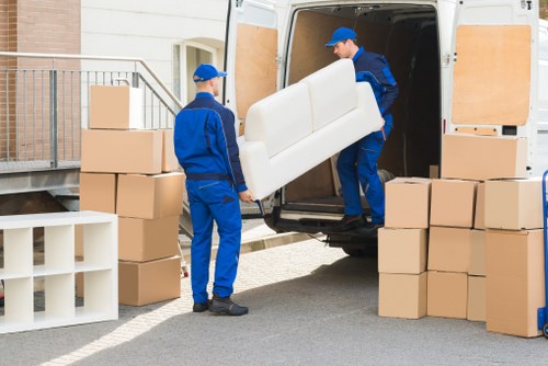 Packed boxes and furniture loaded into a removal van in Charingcross