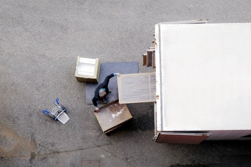 Packed boxes and furniture ready for a home move in a Charing Cross flat