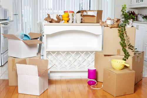 Commercial office relocation preparation with boxes and furniture
