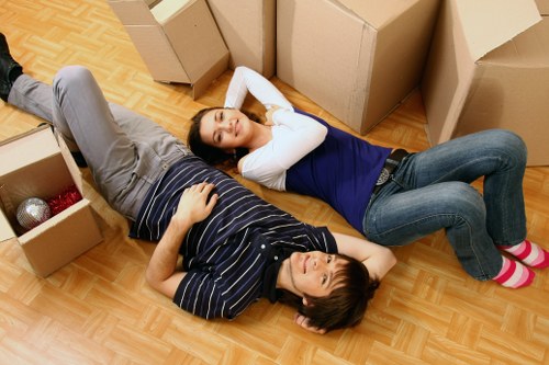 Loading boxes and furniture into a removals van near Charingcross